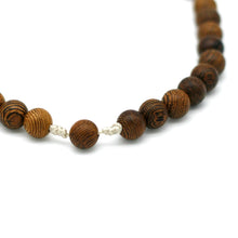 Charger l'image dans la galerie, explication du noeud de chapelet en corde